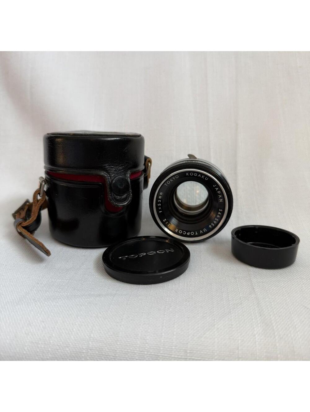 Tokyo Kogaku 53mm f2 Lens Made In Japan W/ Leather Case, back cap and front cap